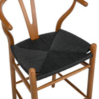 Wooden chair with black woven seat on a white background