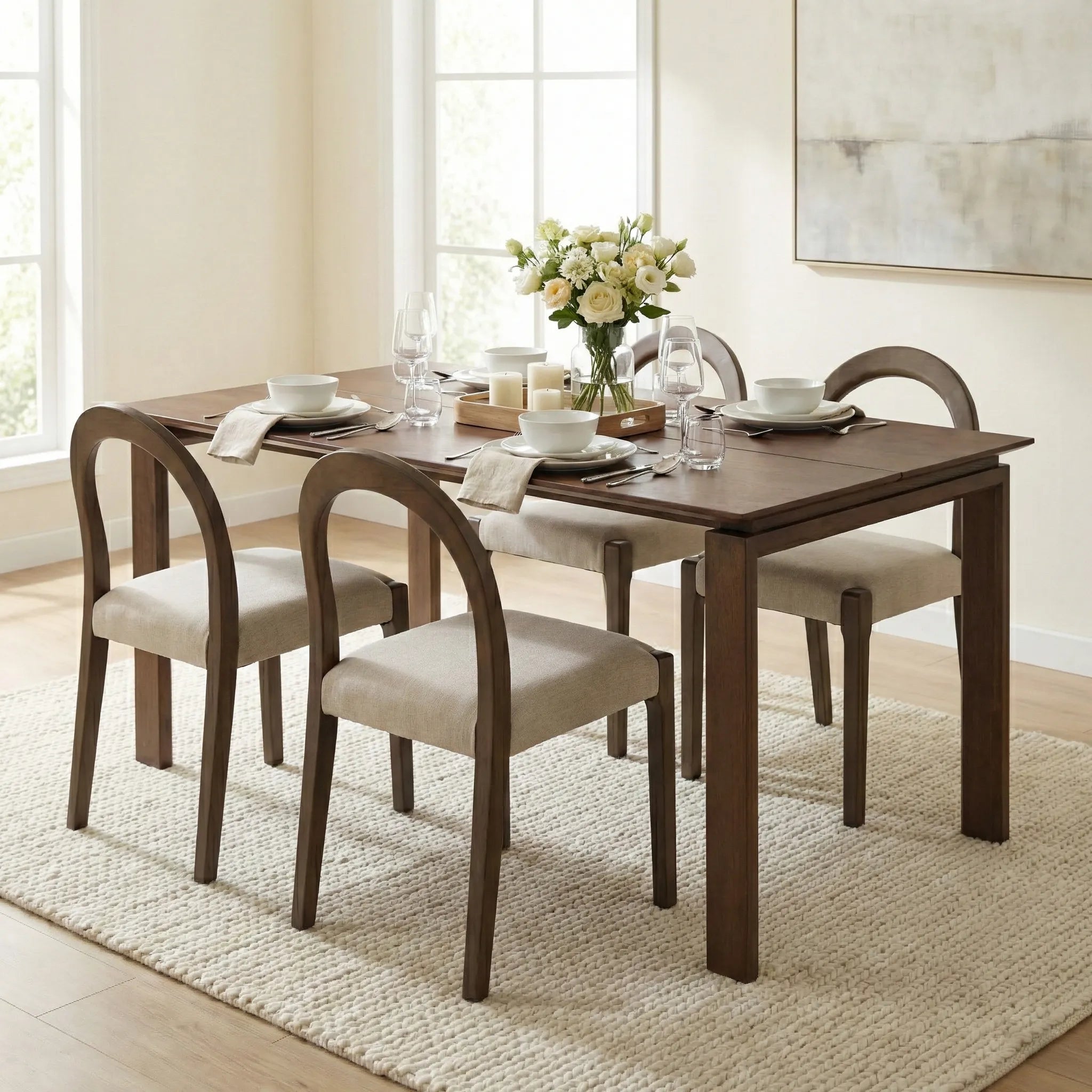 Dining room with a wooden table and chairs set, decorated with a vase of flowers.