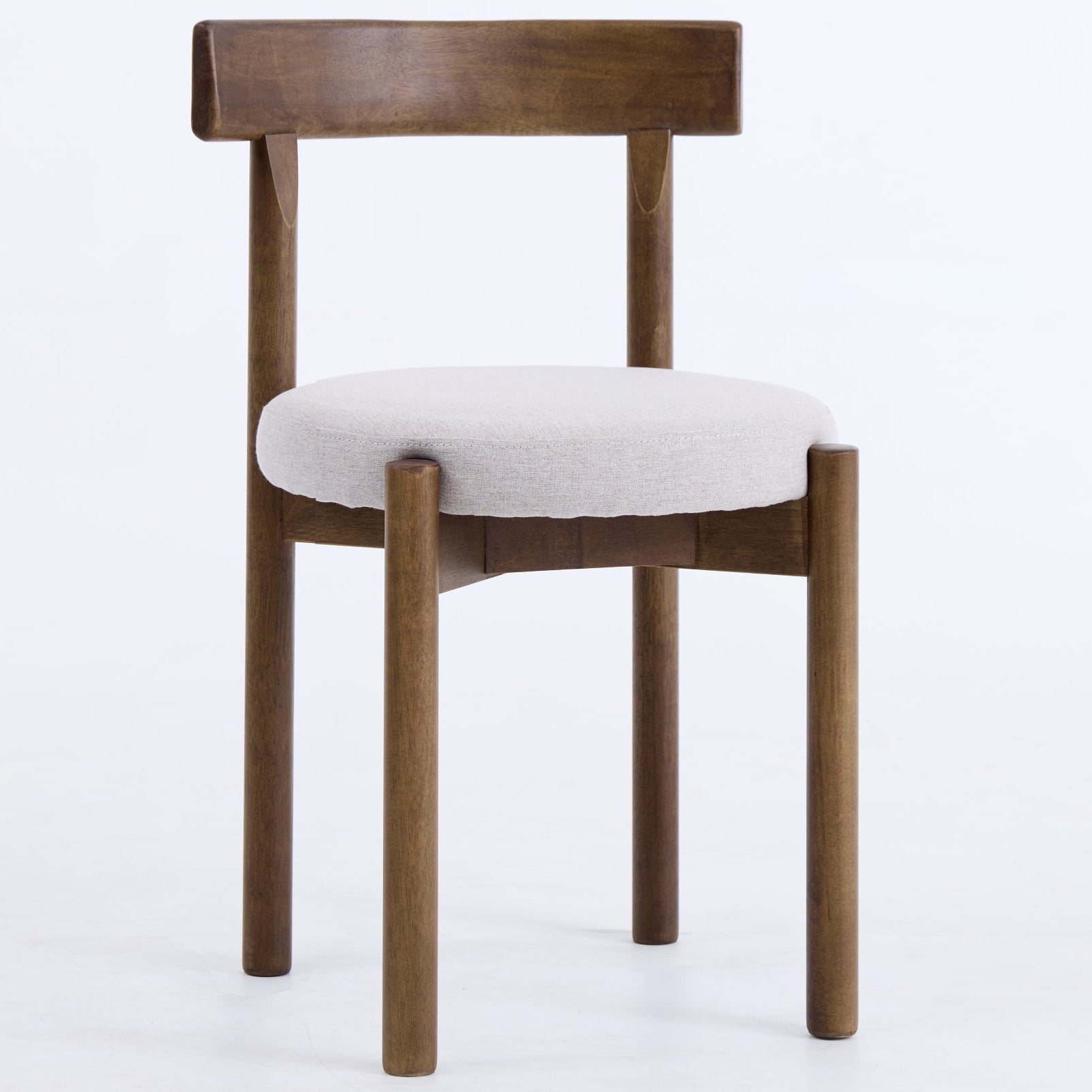 Wooden chair with a white cushion on a white background