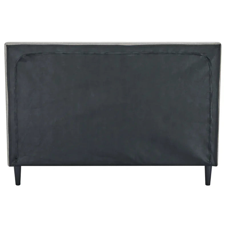 Black leather headboard on a white background