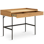 Wooden desk with black metal legs on a white background