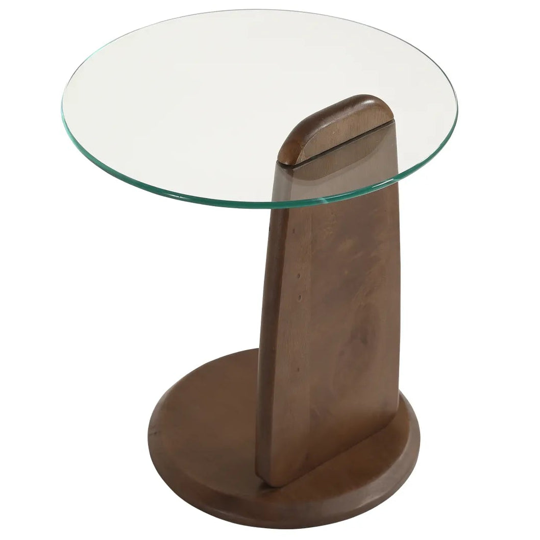 Glass-top side table with wooden base on a white background