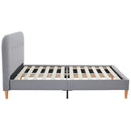 Gray upholstered bed frame with wooden legs on a white background