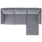 Gray upholstered sectional sofa on a white background