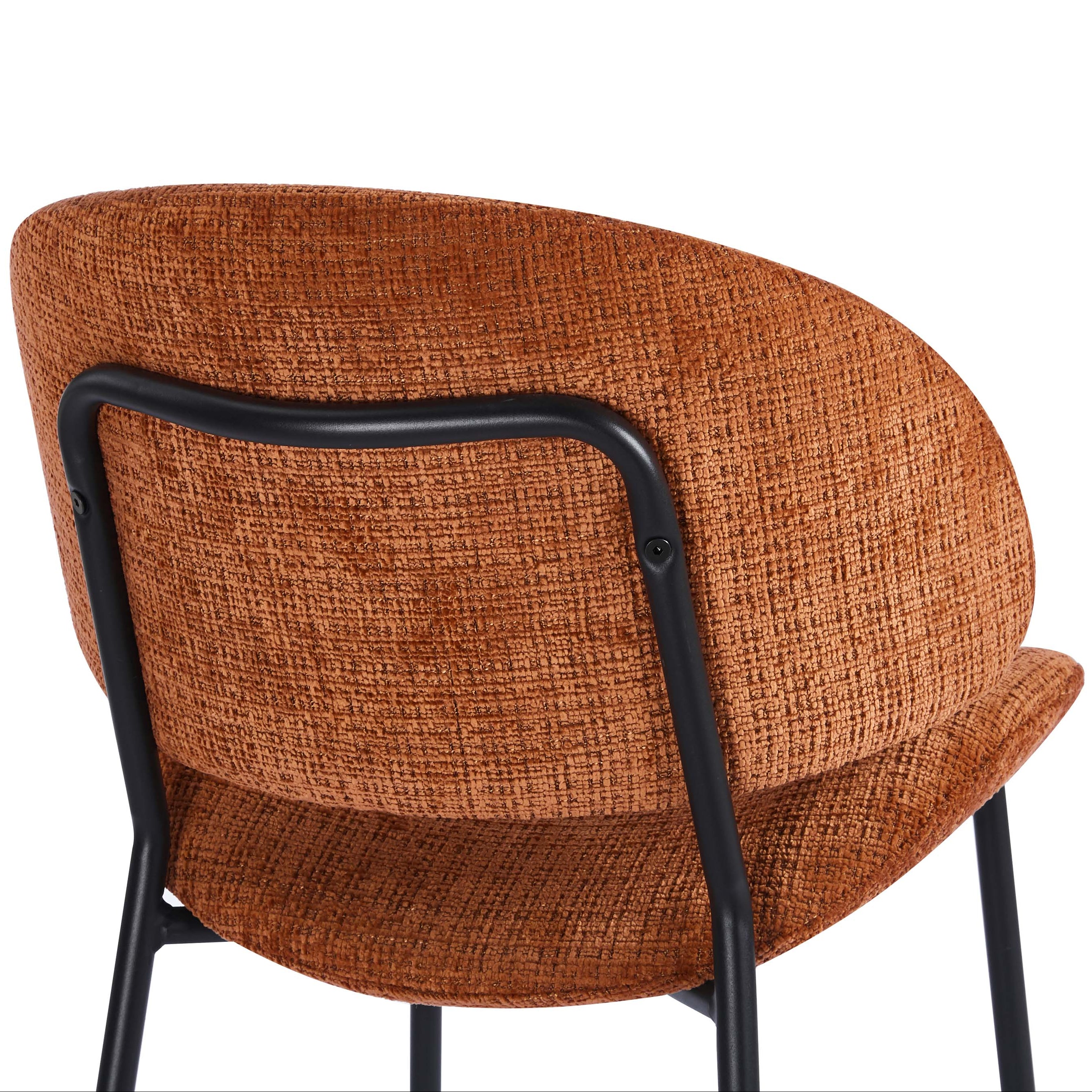 Brown textured chair with black metal frame on a white background