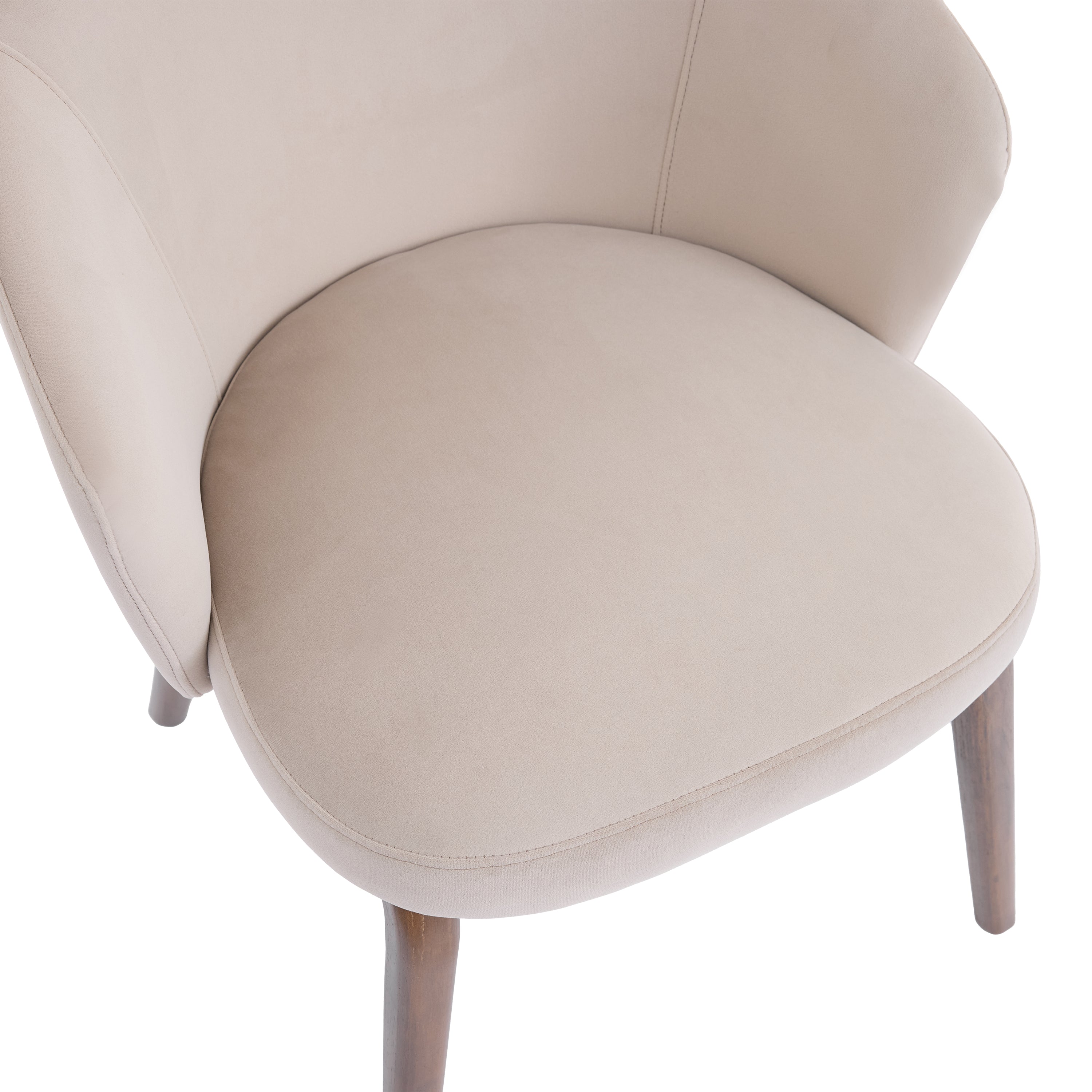 Close-up of a beige chair with a white background